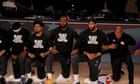 lakers-and-clippers-take-a-knee-together-during-national-anthem-on-nba-return-–-video